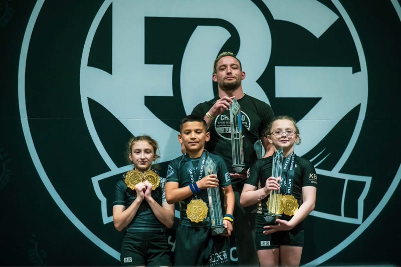 Labyrinth BJJ athletes with trophies and medals at Battleground competition