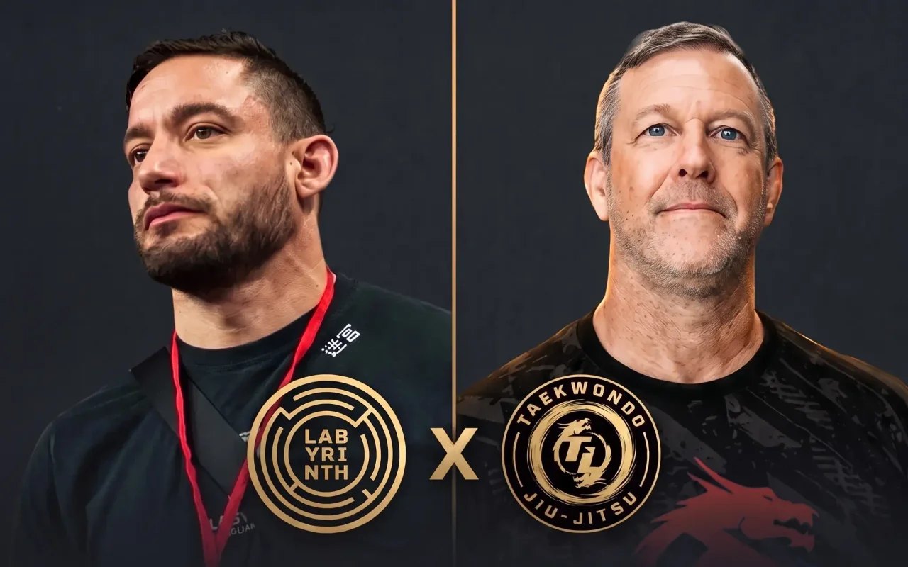Head coach Anthony Curry of Labyrinth BJJ and Grandmaster Scott Jones of Team Legacy Martial Arts, with both school crests