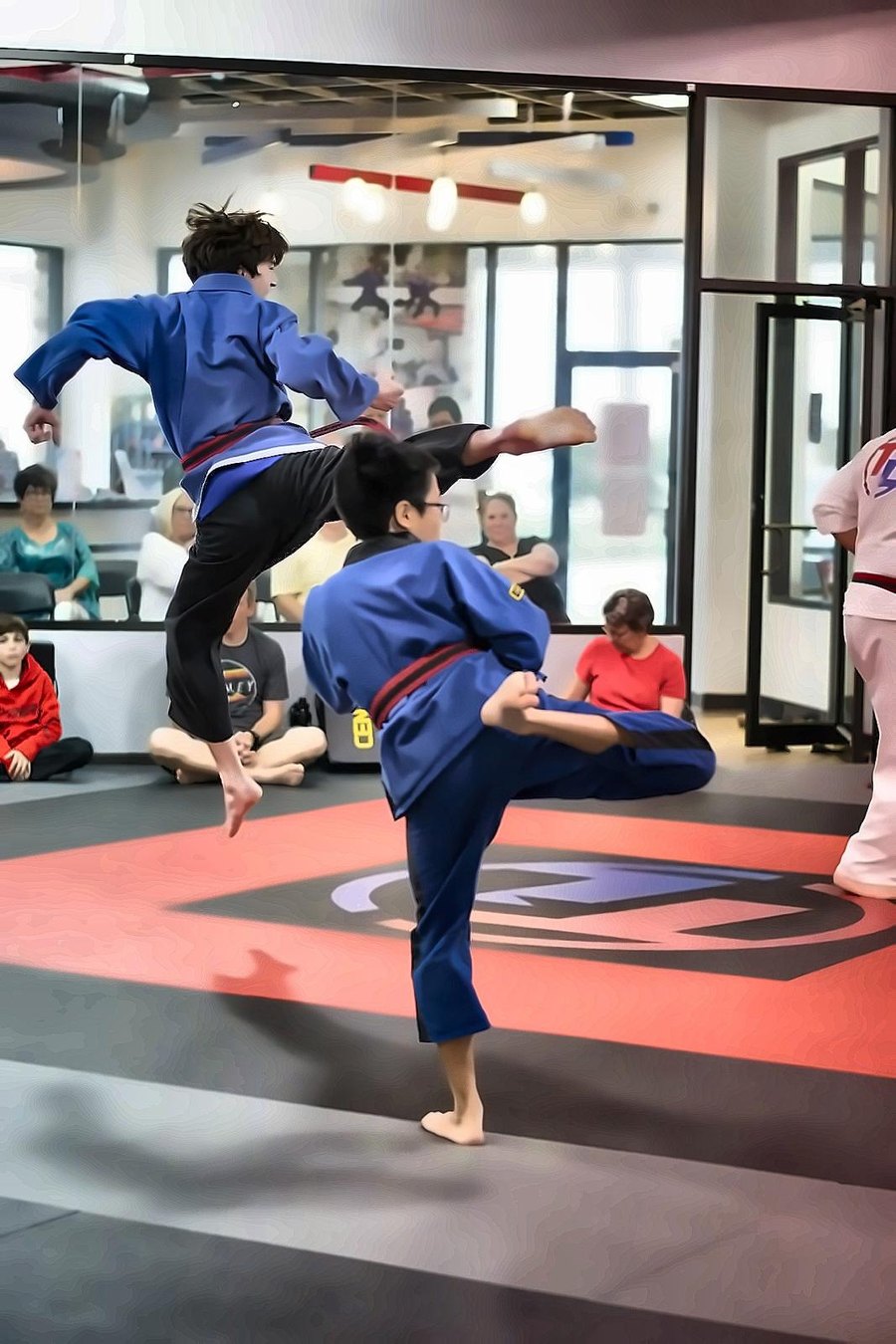 A Team Legacy Taekwondo student mid-kick
